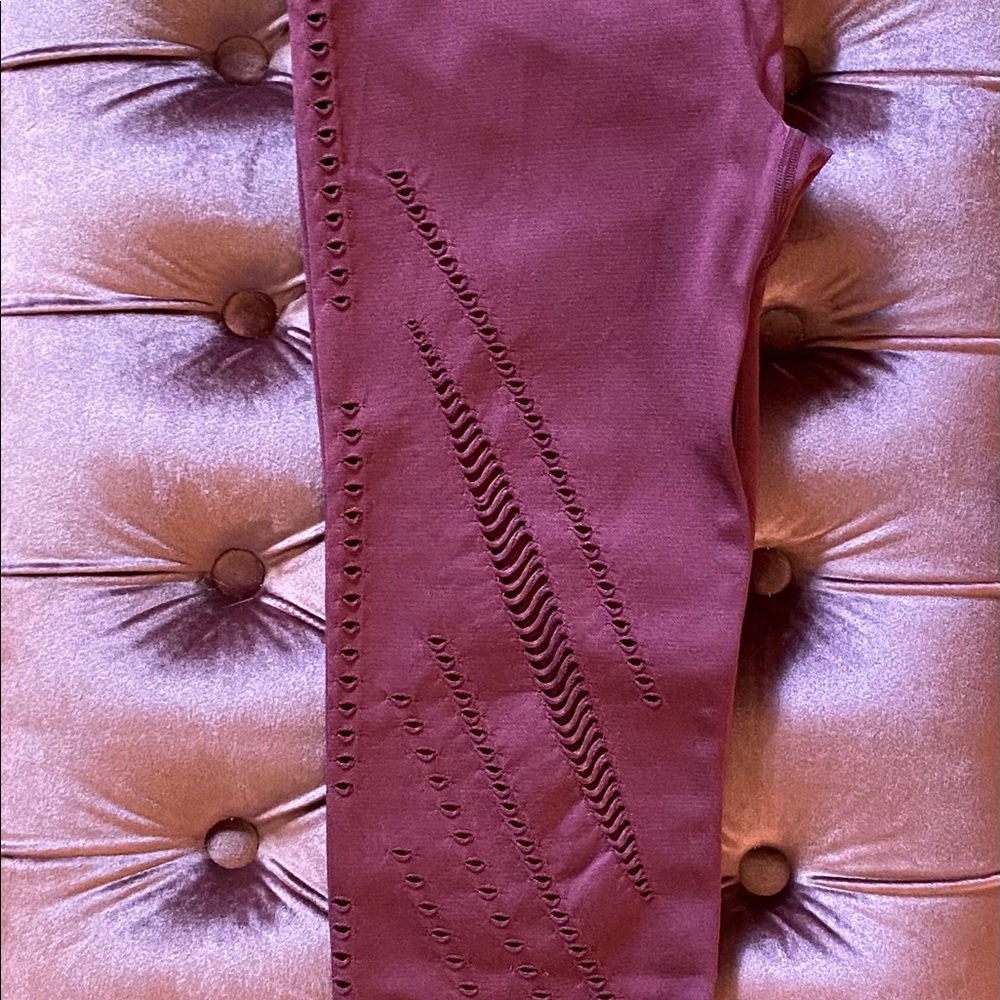Work out pants , color mauve .